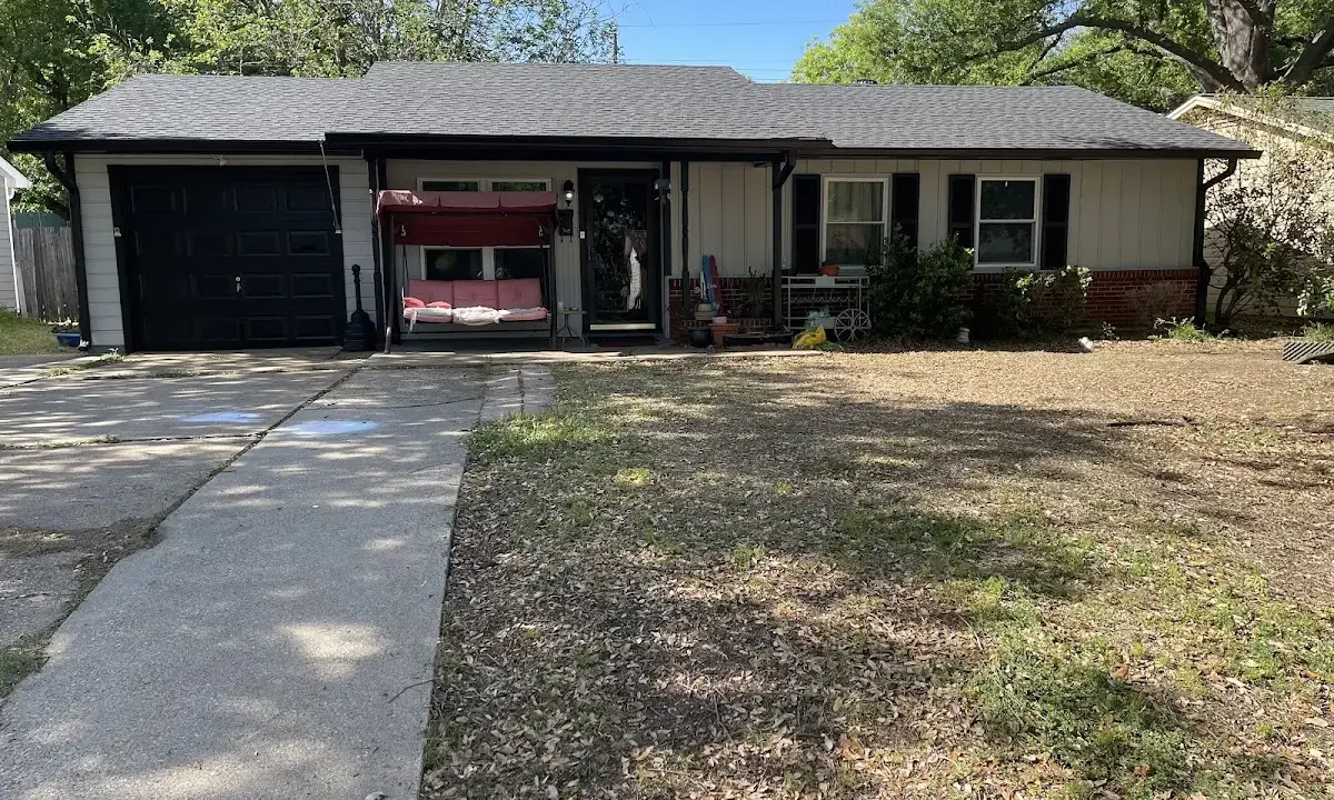 Wind Damage Roof Repair crew at work on a residential roof in Myrtle Beach